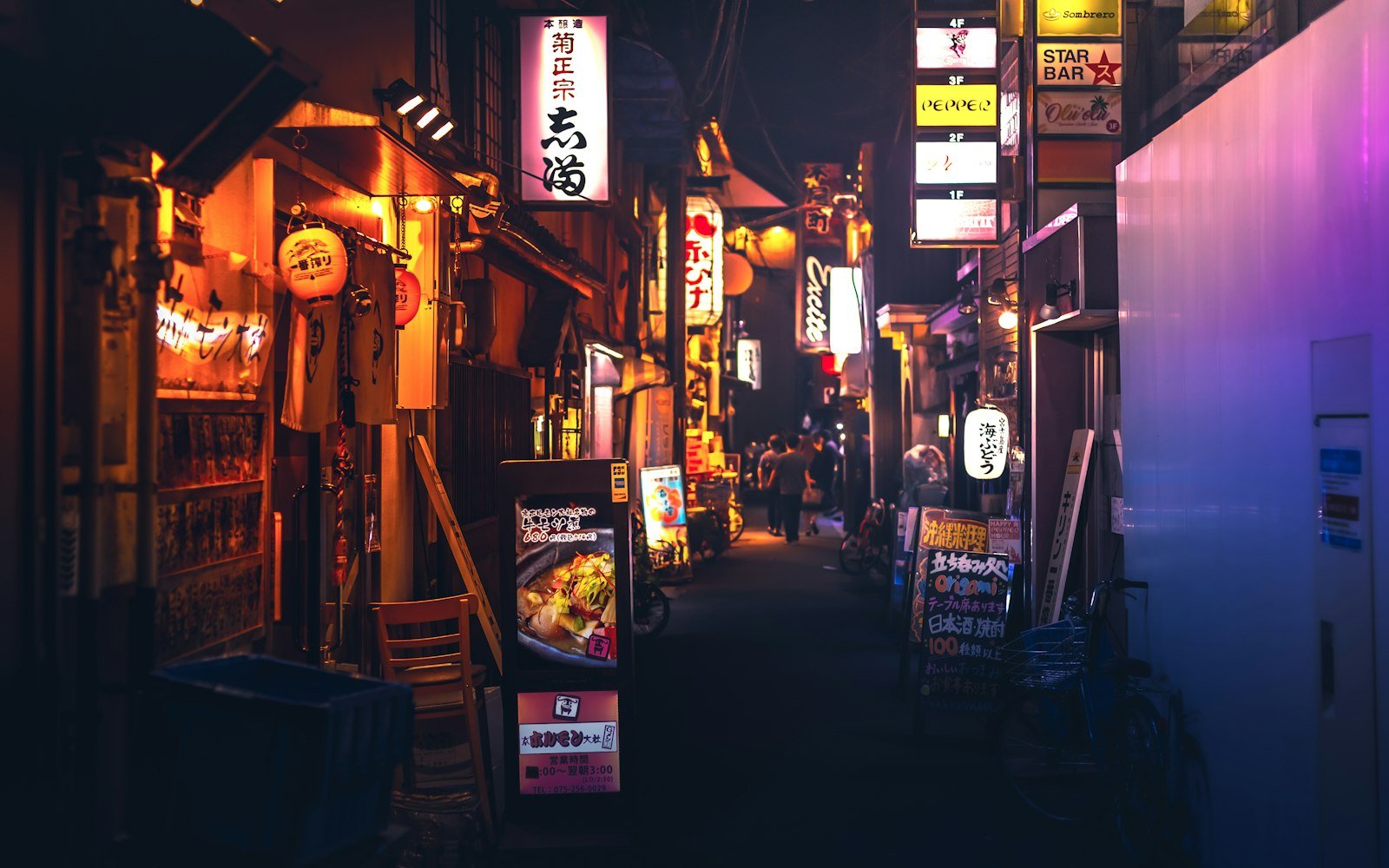 Store with lights turned on during night time in Kyoto, Japan